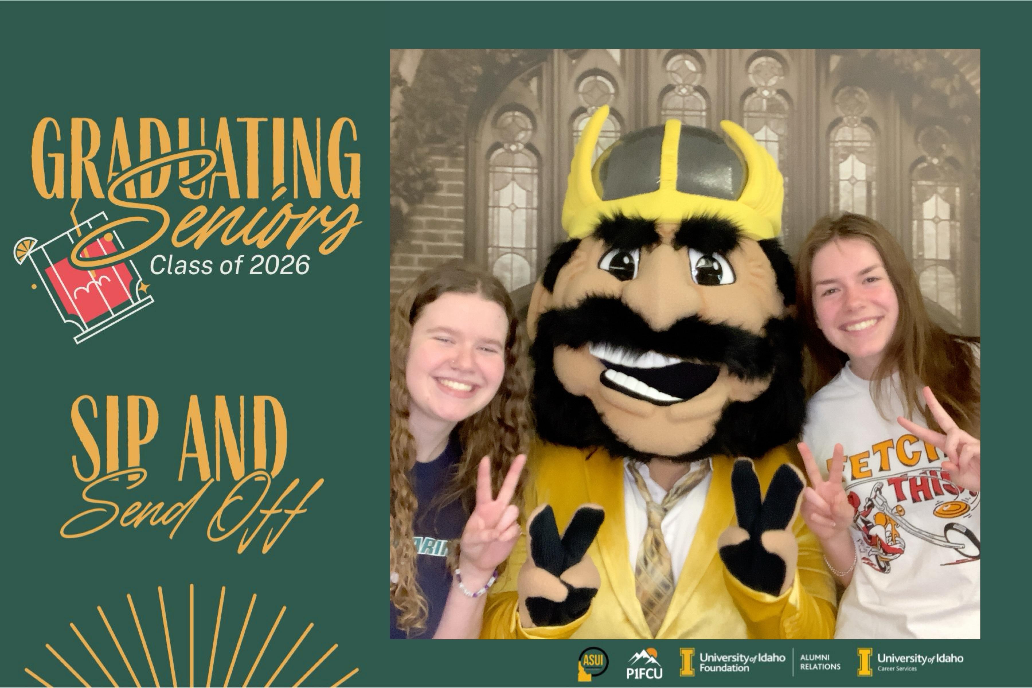 Two graduating seniors posing with their school mascot