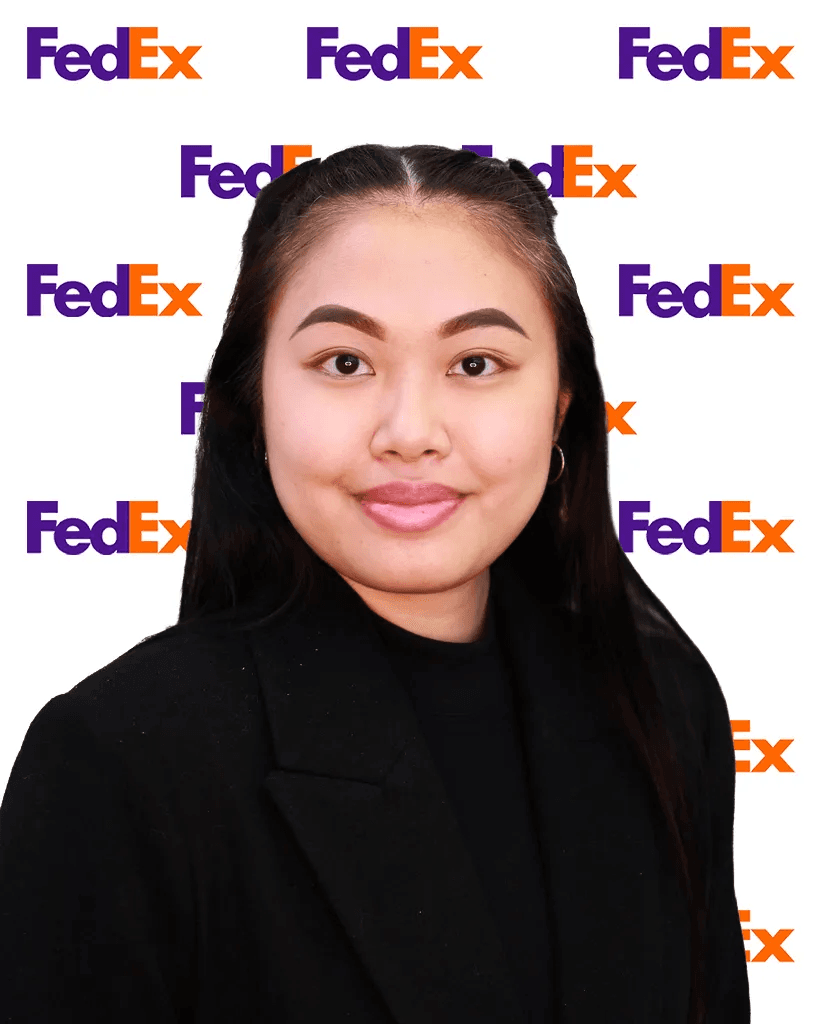 Professional headshot of a woman in a black blazer