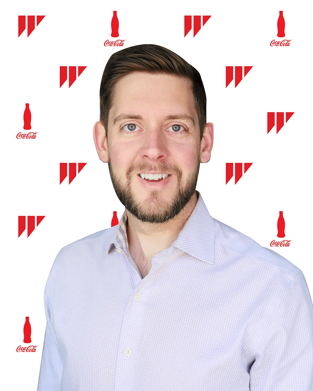 Professional headshot of a man in a white shirt
