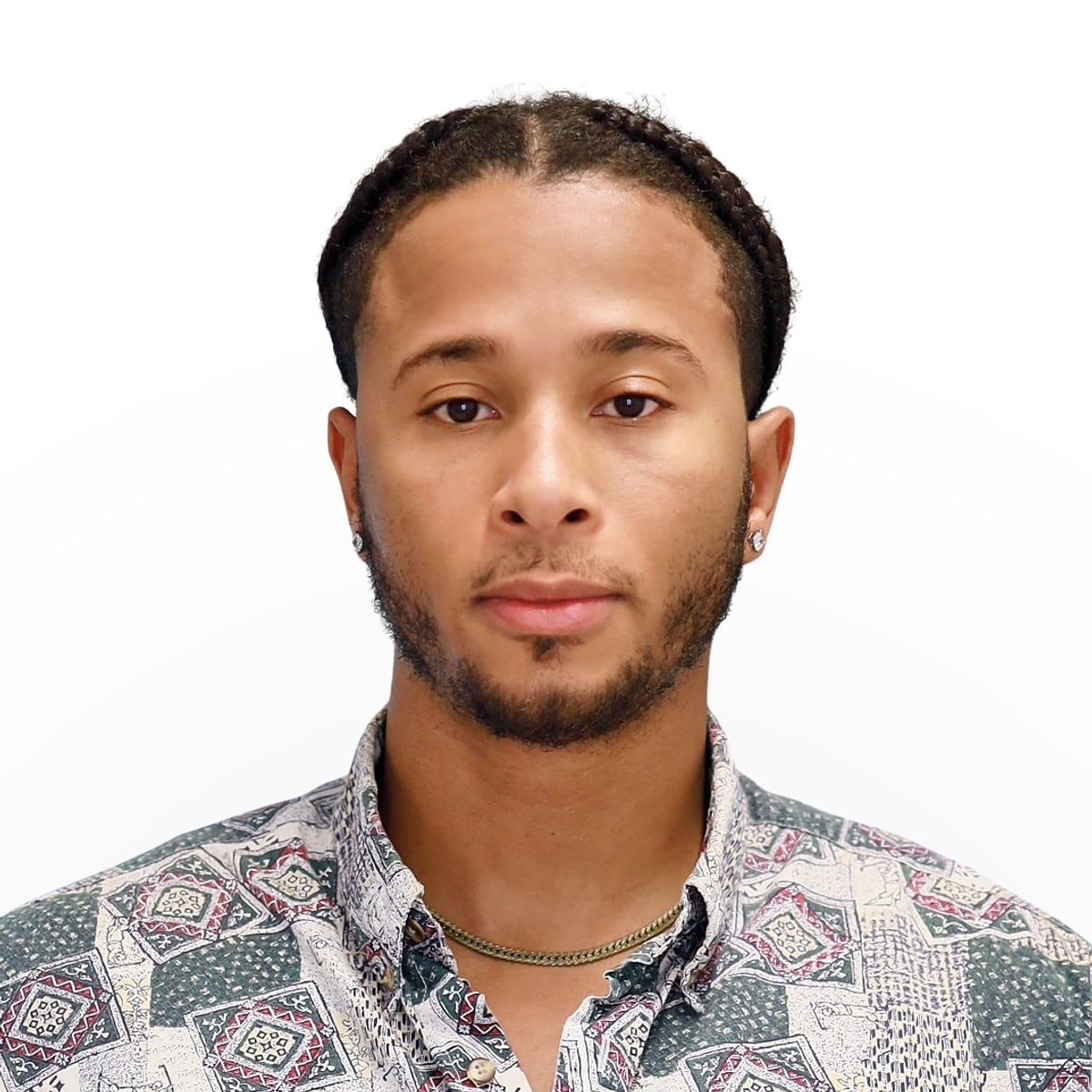Passport photo of a man in a patterned shirt, neutral expression, no glasses, on a plain white background